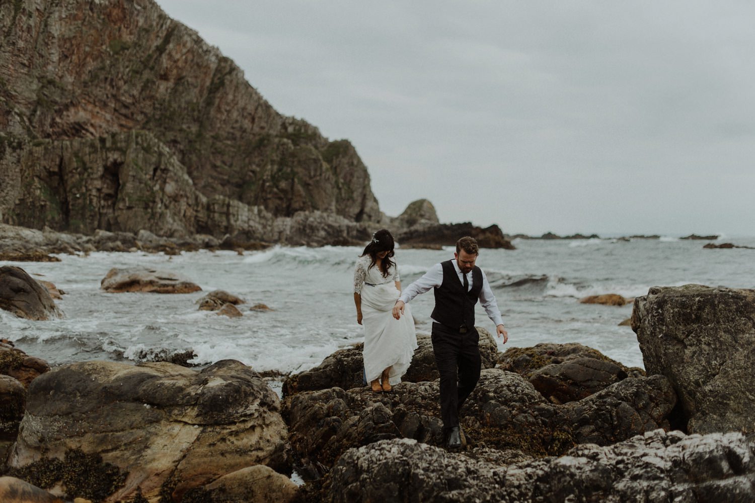 bride and groom exploring islay