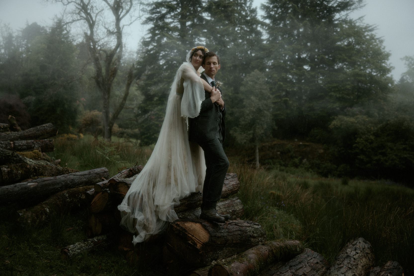 a bride and groom portrait on a misty day in Scotland